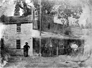 Placer Hotel (Jackass Inn) with original hanging tree behind it in Elstner's hay yard
